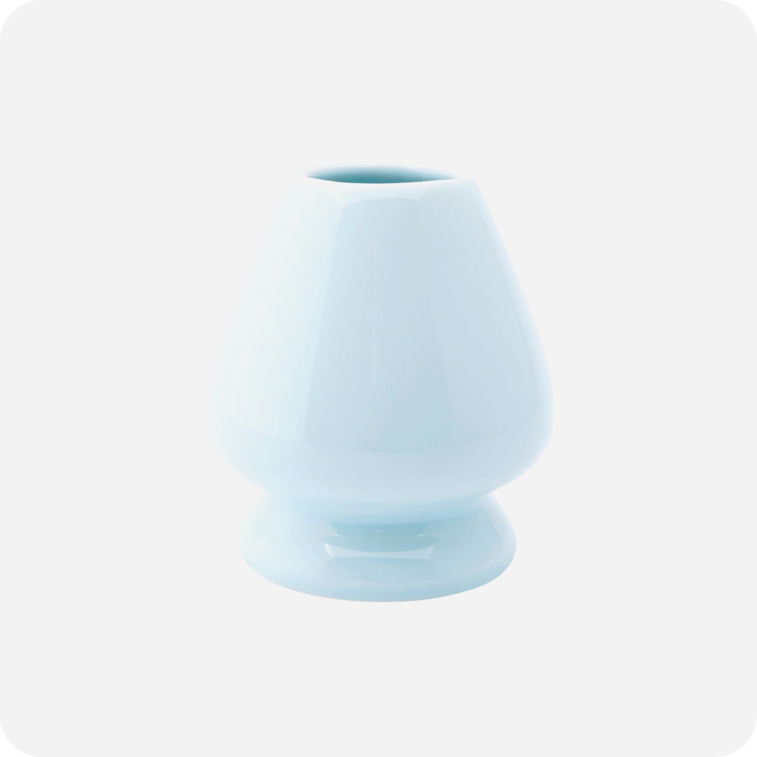 Light blue ceramic vase on a white background