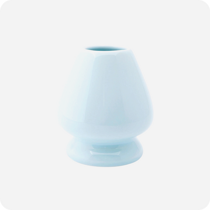 Light blue ceramic vase on a white background